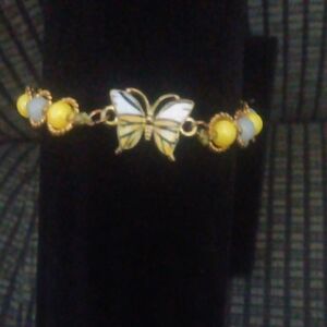 Elegant Butterfly Bracelet with Yellow Accents